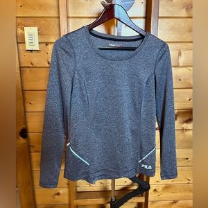 Like New women’s Fila athletic top. Long sleeve size small